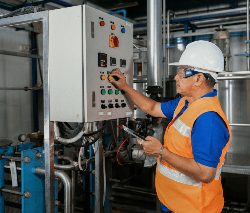 Engineer reviewing industrial cooling controls
